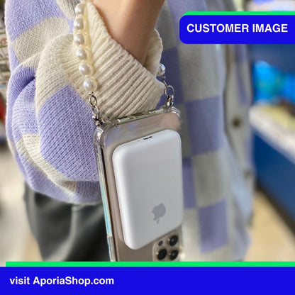 Image of customer holding Aporia MagSafe Clear Case - Pearl Wristlet Strap for iPhone 15/14/13/12 with Iphone MagSafe Powerbank