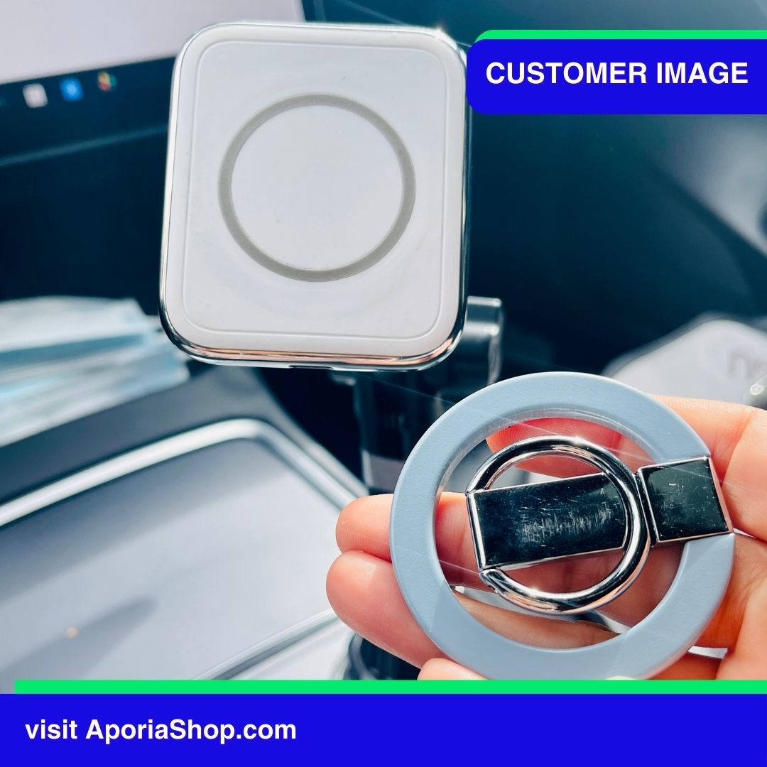 Image of customer holding MagSafe Magnetic Ring Finger Holder Stand inside Tesla car