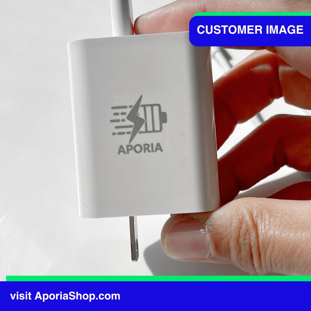 Image of customer holding Aporia 20W Dual Port Wall Charger - USB Type A and USB Type C